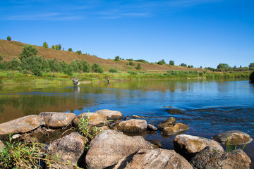 Beautiful landscape with river. Fishing in a rural location