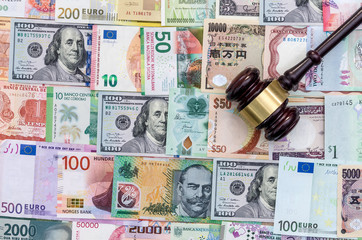 Top view of judge gavel on banknote background