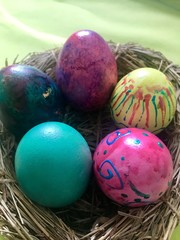 Fototapeta na wymiar Easter Eggs in straw nest