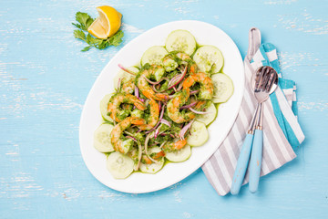 MEXICAN CUISINE. Aguachile de camaron. Prawns aguachile. Shrimps eviche cebiche with cucumber,...