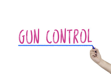 Human's hand writing Gun control with marker. Human rights, GUN CONTROL concept.