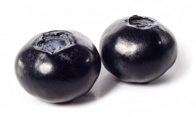 Tasty fresh blueberries or blueberry isolated on white background close up macro. Macro fruit ecology health concept.