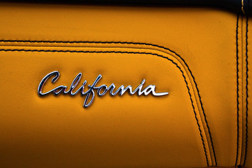 California logo design on leather background