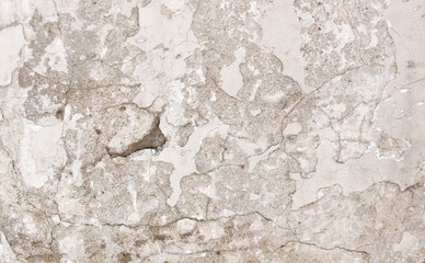 Schöne schmutzige Wand aus Stuck fiel irgendwo von einer Grube aus abgebrochenen Brüchen Texturhintergrund