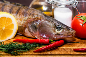 Fresh zander wilt lemon, pepper and spices close