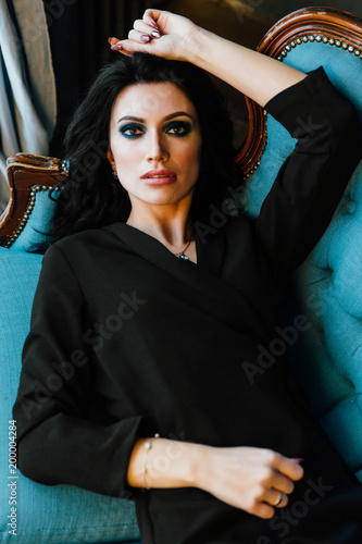Attractive Young Woman Lying At The Sofa Top View