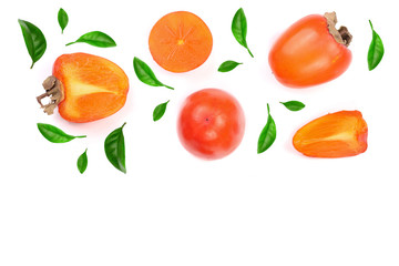 persimmon decorated with leaves isolated on white background with copy space for your text. Top view. Flat lay pattern