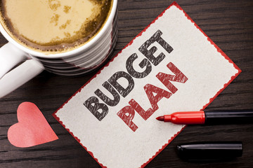 Text sign showing Budget Plan. Conceptual photo Accounting Strategy Budgeting Financial Revenue Economics written on Sticky Note on the wooden background Coffee Cup Heart Marker next to it.