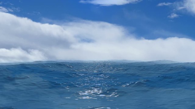Blue Ocean View with Clouds on the Horizon