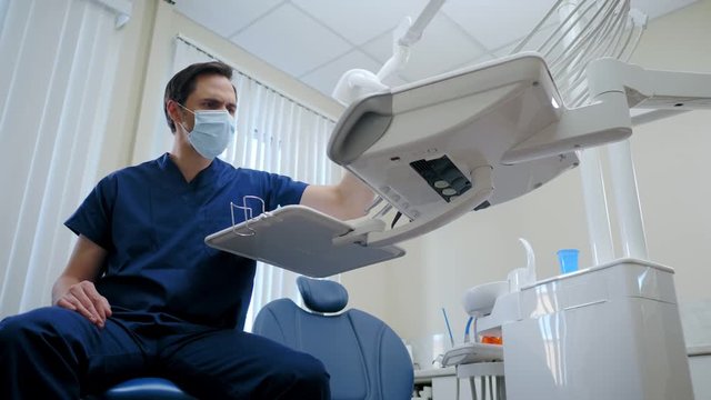 Man dentist working in private practice.