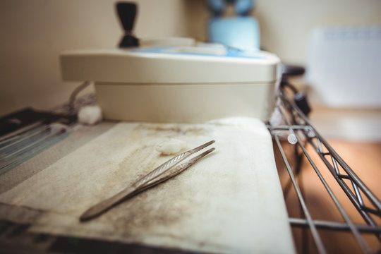 Close-up of forceps on trolley