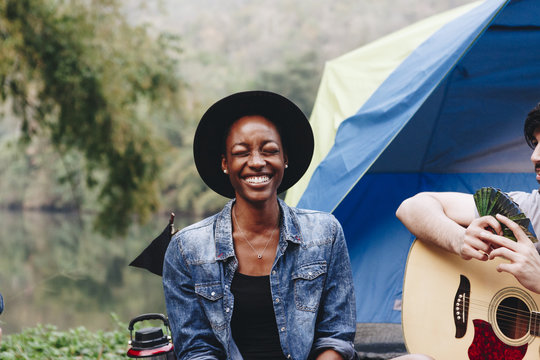 Happy woman at a campsite