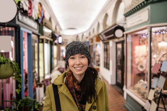 Smiling woman standing in the supermarket