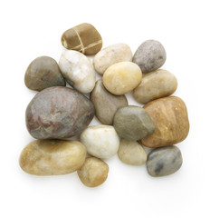 different types of pebble stones against white background