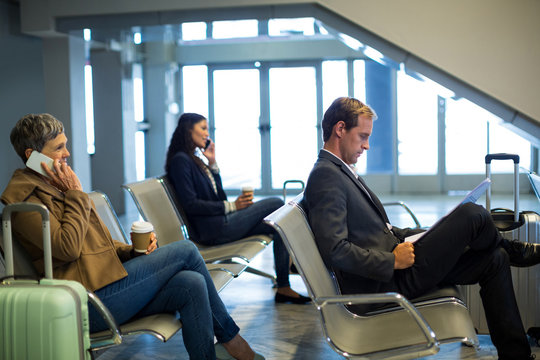 commuters waiting in waiting area