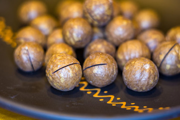 macadamia, Australian nut in a ceramic plate