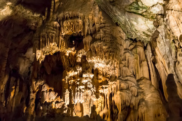 Postojna cave, Slovenia. Formations inside cave with stalactites and stalagmites