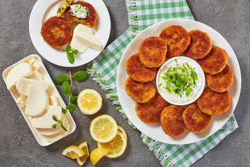 crispy rice cutlets on white plate