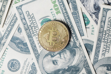 Mini Bitcoin on dollar background, Digital Money and Bitcoine Concept.
