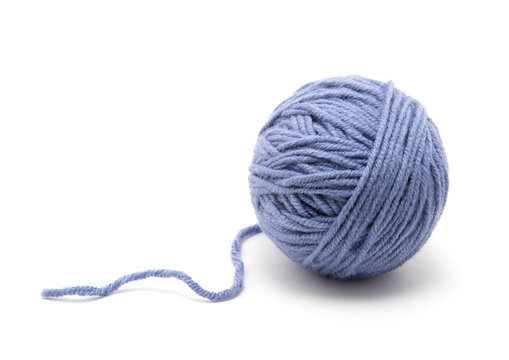 Ball of yarn on white background