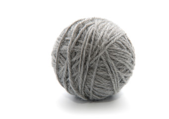 Ball of yarn on white background