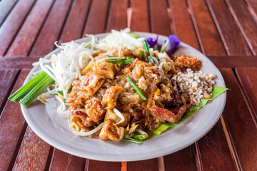 Pad Thai of Noodle stir-fried with meat and vegetable, traditional food