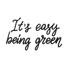 It's easy to being green- hand drawn lettering phrase isolated on the black background. Fun brush ink vector illustration for banners, greeting card, poster design.