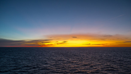 Obraz premium Crossing by ferry at sunrise to Sardinia 