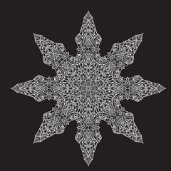 Popular decorative motif in South Eastern Asia. Intricate star shaped ornament. Hand drawing. Tattoo design. Isolated on black background. EPS10 vector illustration