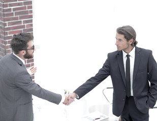 welcome and handshake of business partners