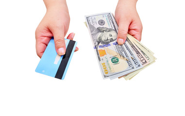 Hands holding us dollar bills and credit card on a white background.