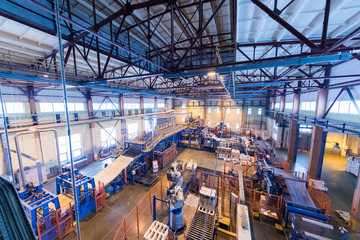 Obraz premium Fiberglass production industry equipment at manufacture background