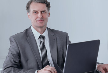 businessman is working with laptop in office