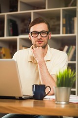 Fototapeta premium Young man with a laptop