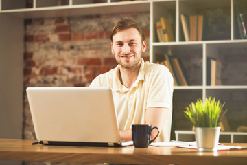 Young man with a laptop