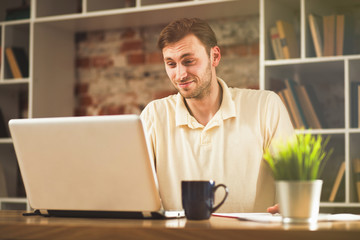 Young man with a laptop