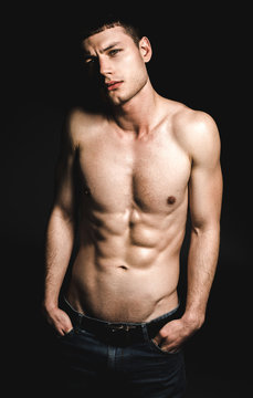 Portrait of orderly man with attractive body looking at camera