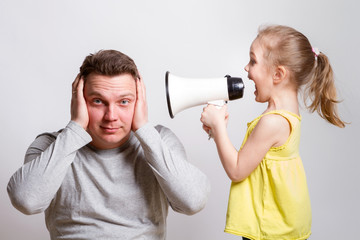 child in a megaphone parent