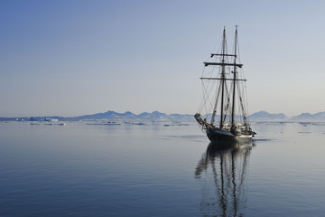 sailing ship in arctic sea with copy space