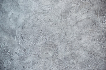 Texturized grey putty. Vintage or grungy background of venetian stucco texture as pattern wall.