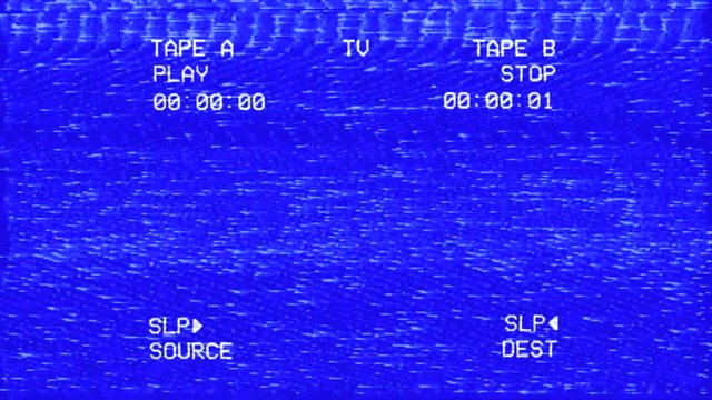 An old damaged VHS tape tracking a bad signal from a double deck, with the text Fatal error.
