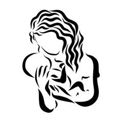 A loving mother looks at her newborn baby