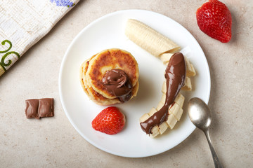 Breakfast pancakes, cooking, fruits, blueberries, strawberries, sour cream, sugar, cottage cheese, flour, eggs, banana, chocolate