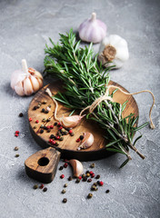 Fresh rosemary on a vintage wooden board