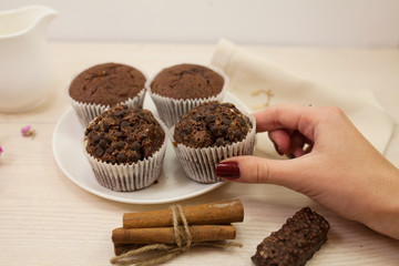 Chocolate muffins with crispy top (selective focus)
