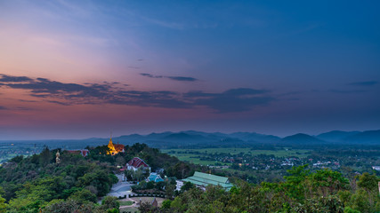 Wat Phrathat Doi Saket with colorful sunset sky and clouds. Chiang Mai, Thailand.