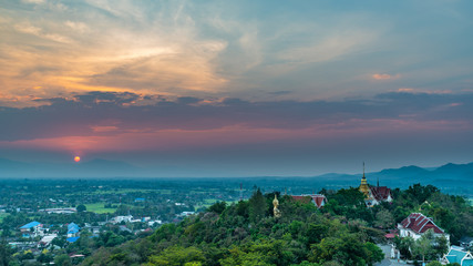 Wat Phrathat Doi Saket with colorful sunset sky and clouds. Chiang Mai, Thailand.