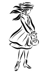 Girl in a beautiful coat with a handbag