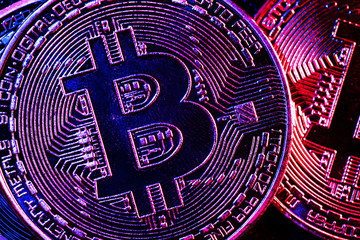 Fototapeta na wymiar Bitcoin coins in a mysterious lighting