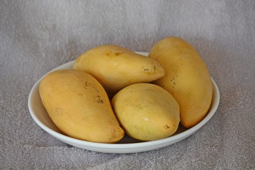 Mango,  it is the fruit that has sour.